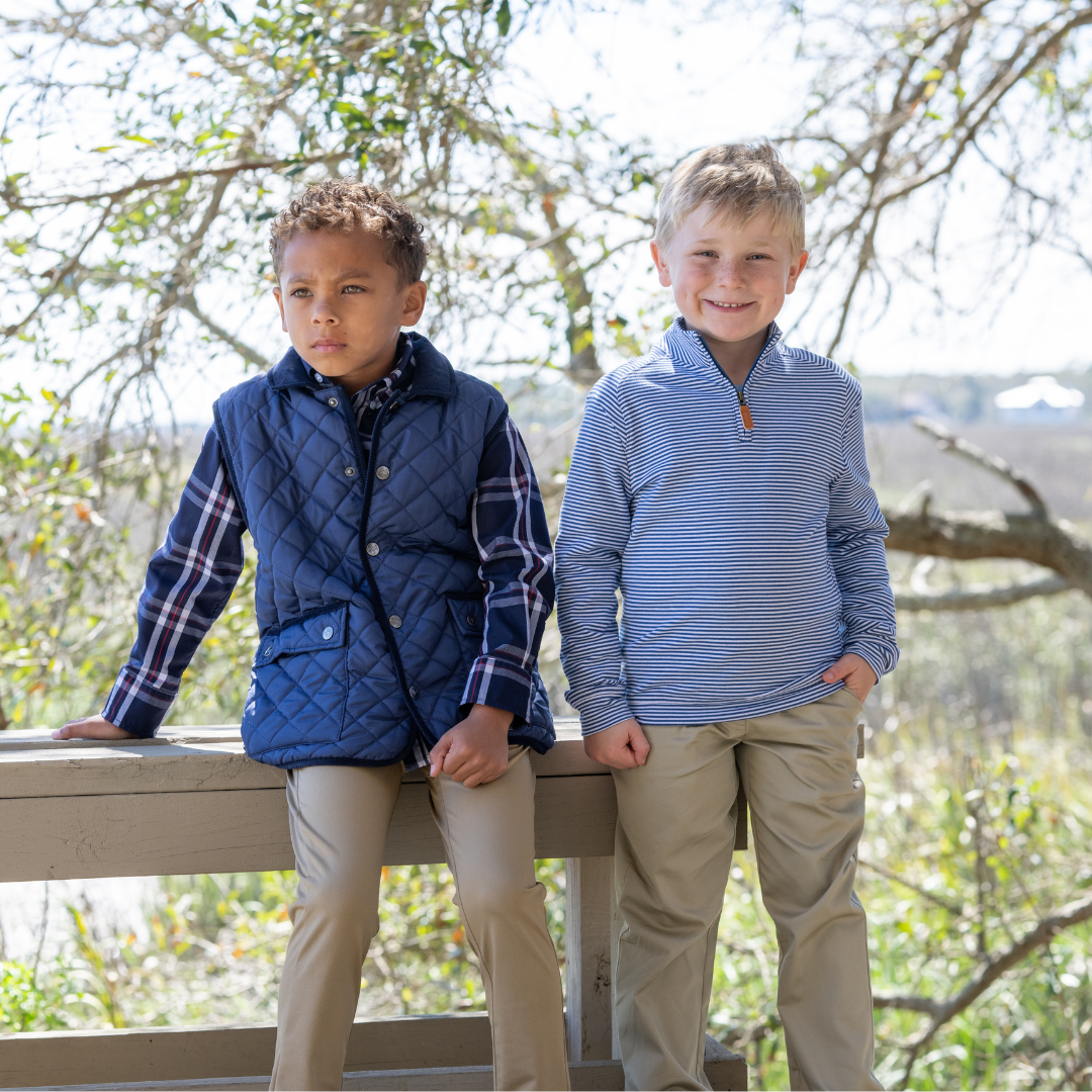 two boys outside wearing Saltwater Boys clothing