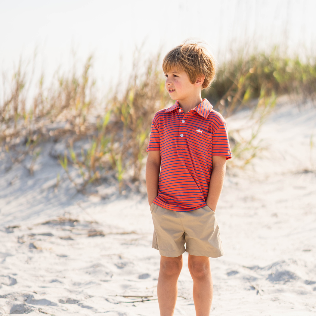 boys against a wall wearing saltwater boys clothing